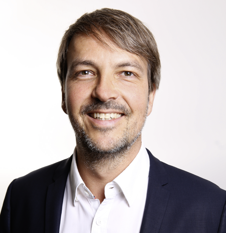 Headshot of Alasdair Cross, VP of Sales (EMEA) at Roqad